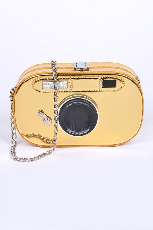 4. Metallic Oval Camera Iconic Swing Clutch Bag